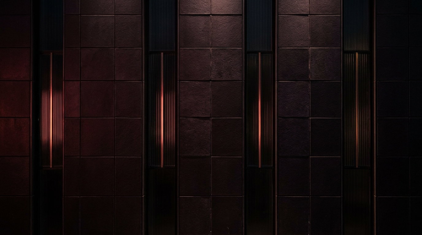 Retícula arquitectónica oscura con acentos de cristal rojo acanalado en penumbra